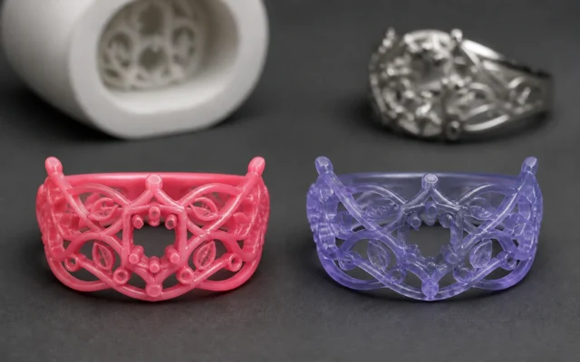 Red wax pattern and castable resin pattern of the same jewelry design side by side