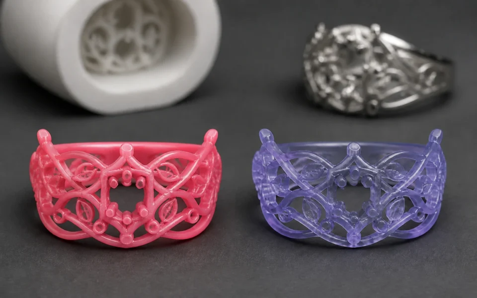 Red wax pattern and castable resin pattern of the same jewelry design side by side